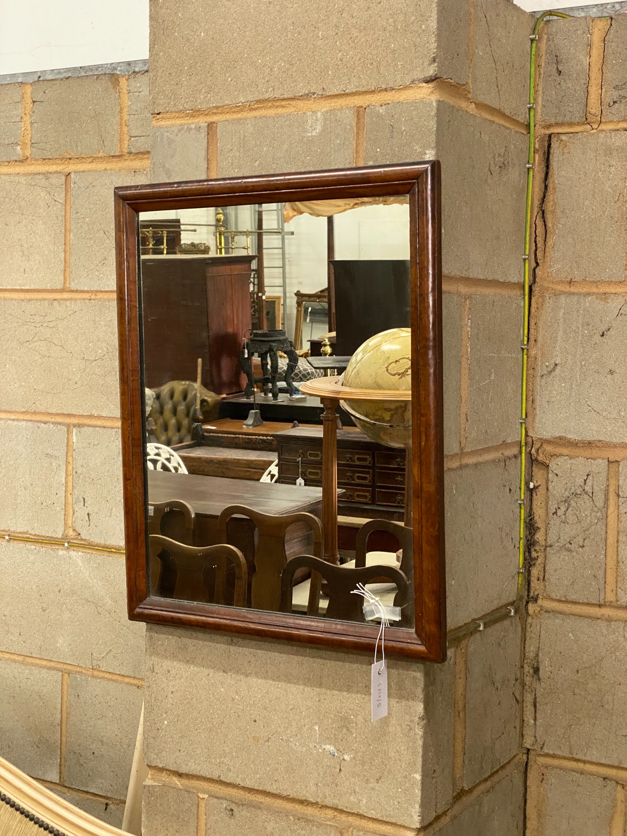 A rectangular walnut framed wall mirror, width 47cm, height 60cm
